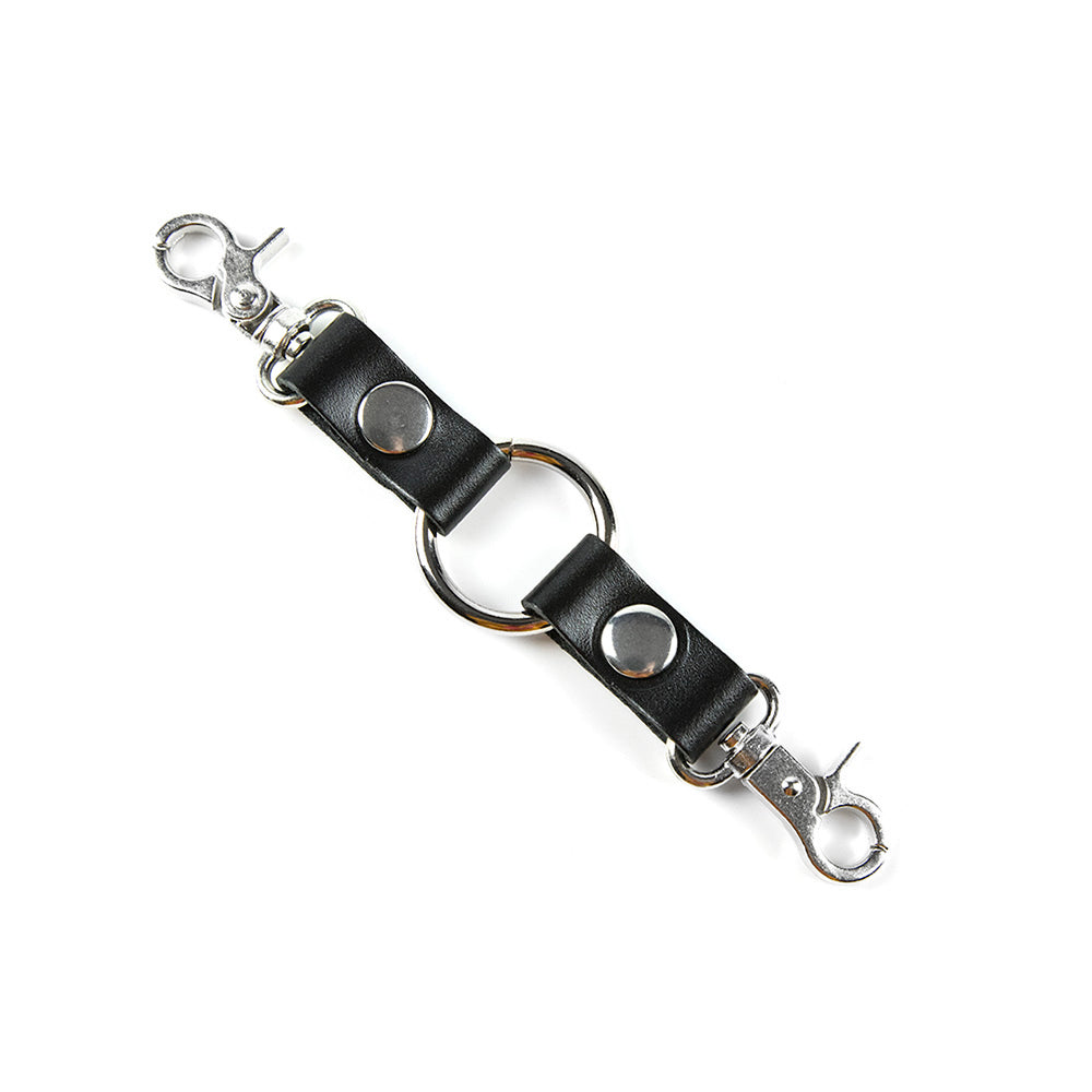 Bondage strap with a ring