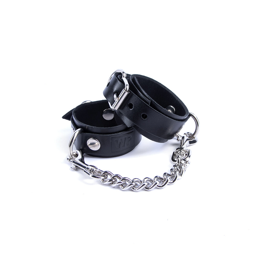 BDSM jewerly cuffs with a chain