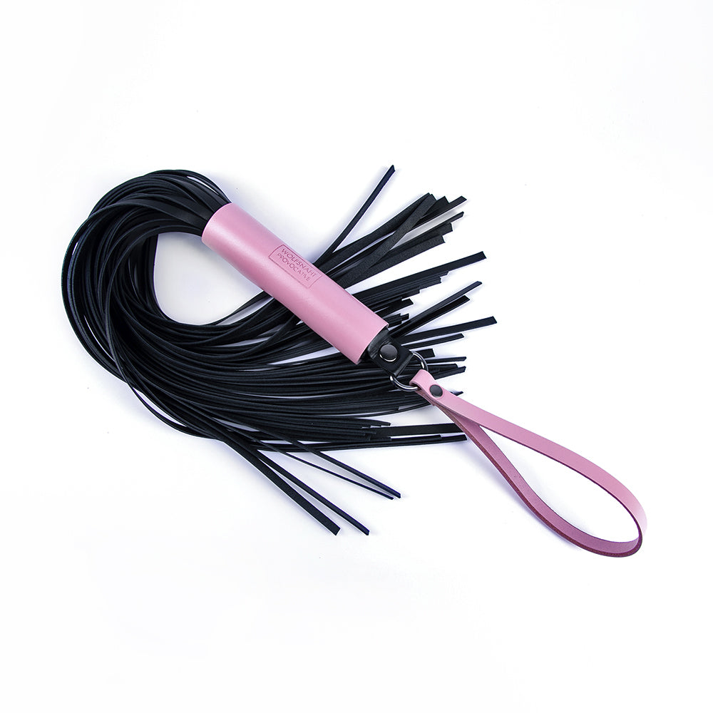 Pink leather flogger for BDSM