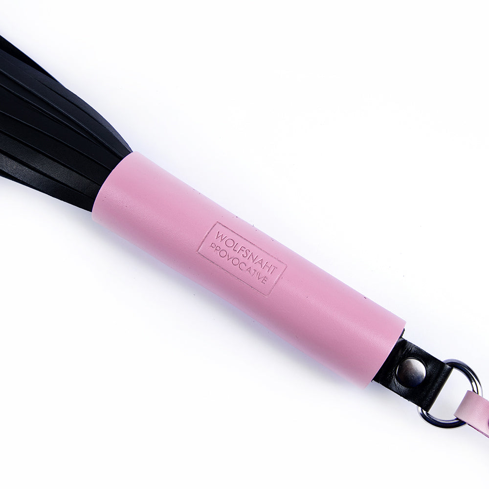 Pink handle BDSM whip