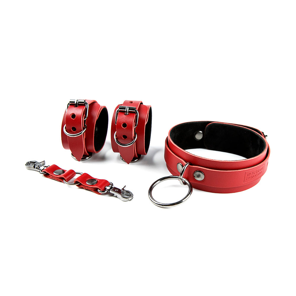 red leather bondage set on suede lining