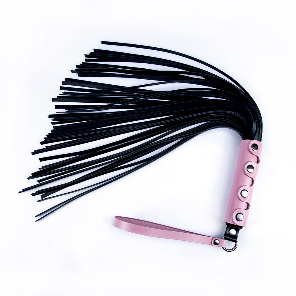Pink leather flogger for BDSM spanking