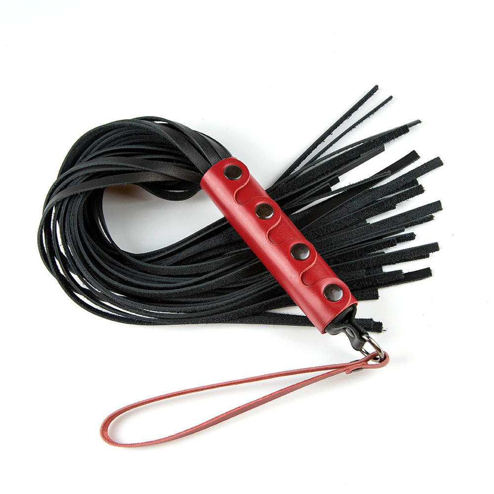 Flogger with leather handle